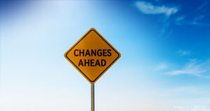 Road sign that says "changes ahead," representing the IRS's plans to revise Form 990 for nonprofit organizations.