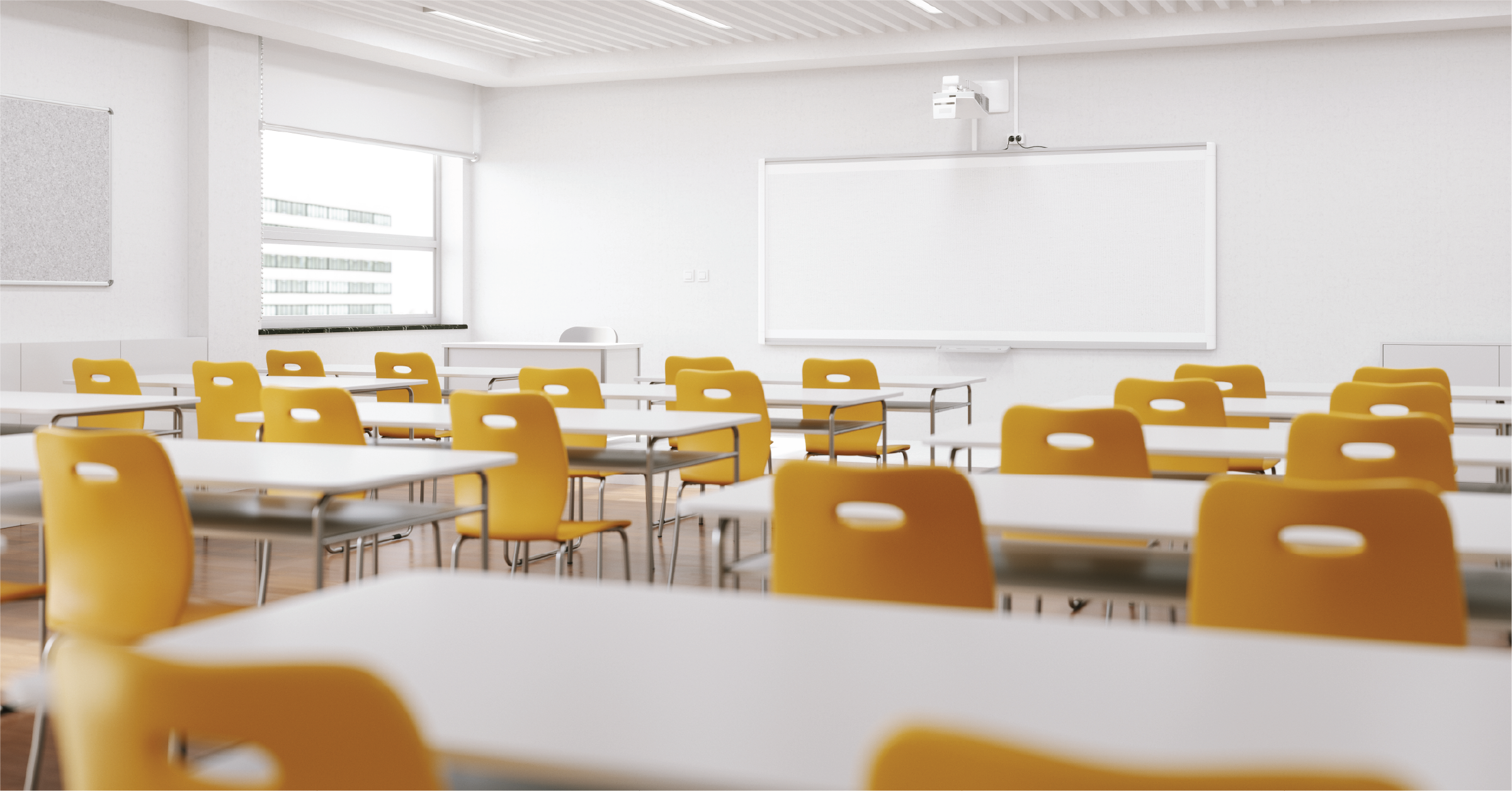 Row of desks in a college classroom, representing the importance of understanding current higher education trends.
