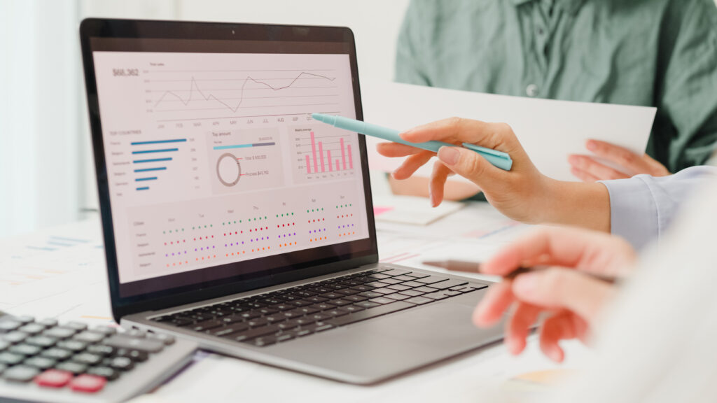 Closeup image of nonprofit financial leaders reviewing financial results.