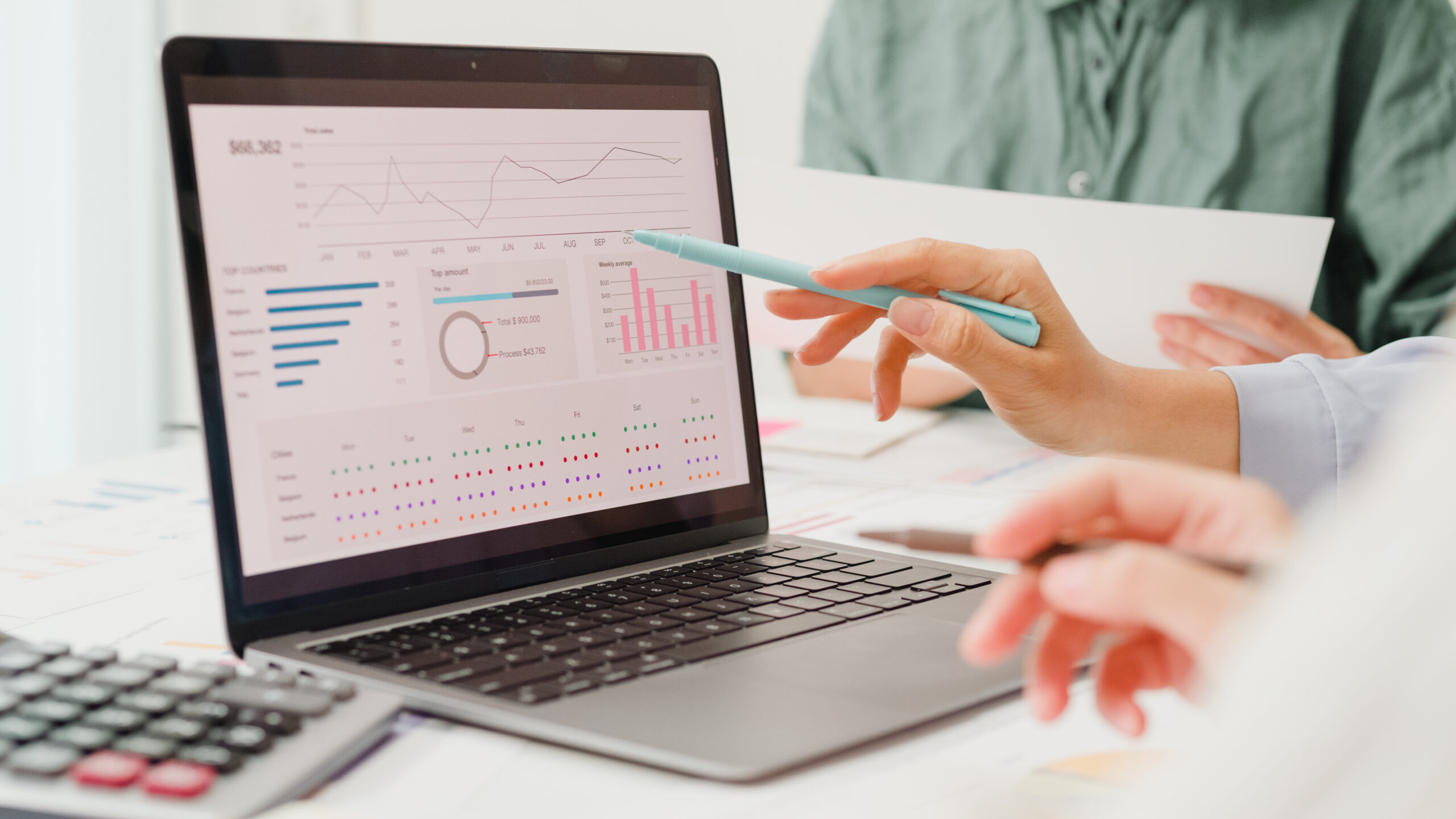 Closeup image of nonprofit financial leaders reviewing financial results.