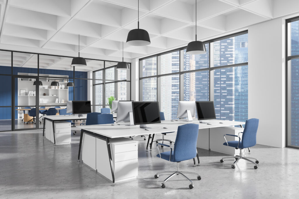 Office interior with computers and desks.