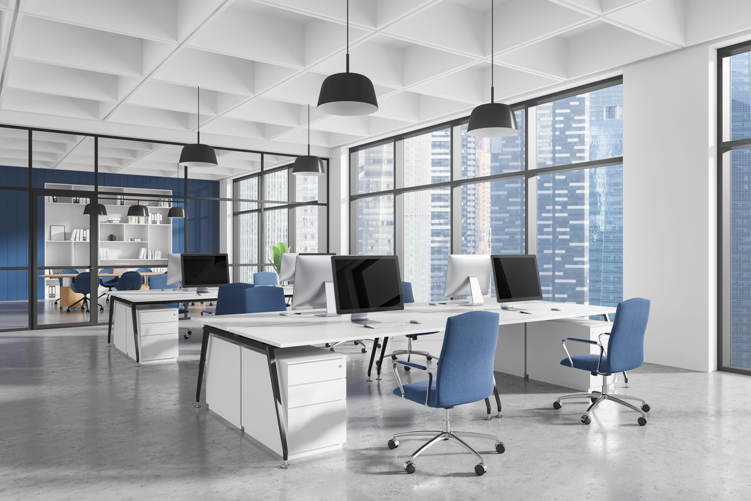 Office interior with computers and desks.